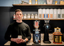 Dale Harris in coffee roastery with GbS grinder